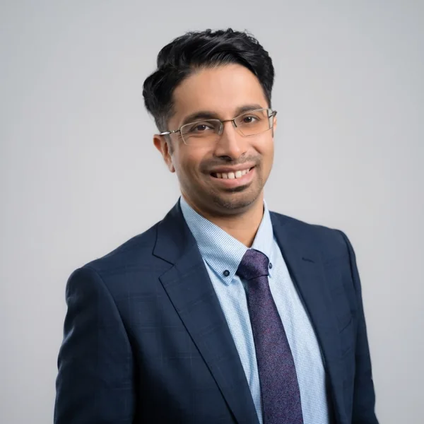 Potret Dr. Jasdev Singh A/L Harbhajan Singh pada halaman resmi penyedia.
