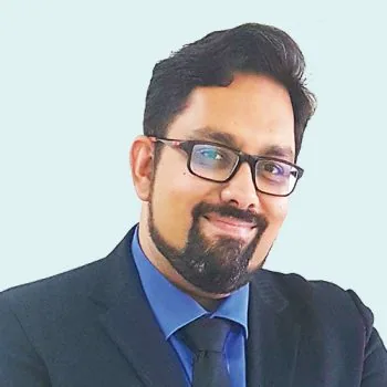 Potret Dr. Pravin Peraba pada halaman resmi penyedia.