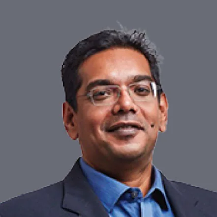 Potret Dr. Muhilan Parameswaran pada halaman resmi penyedia.