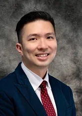 Potret Dr Huang Zhongwei pada profil resmi penyedia.